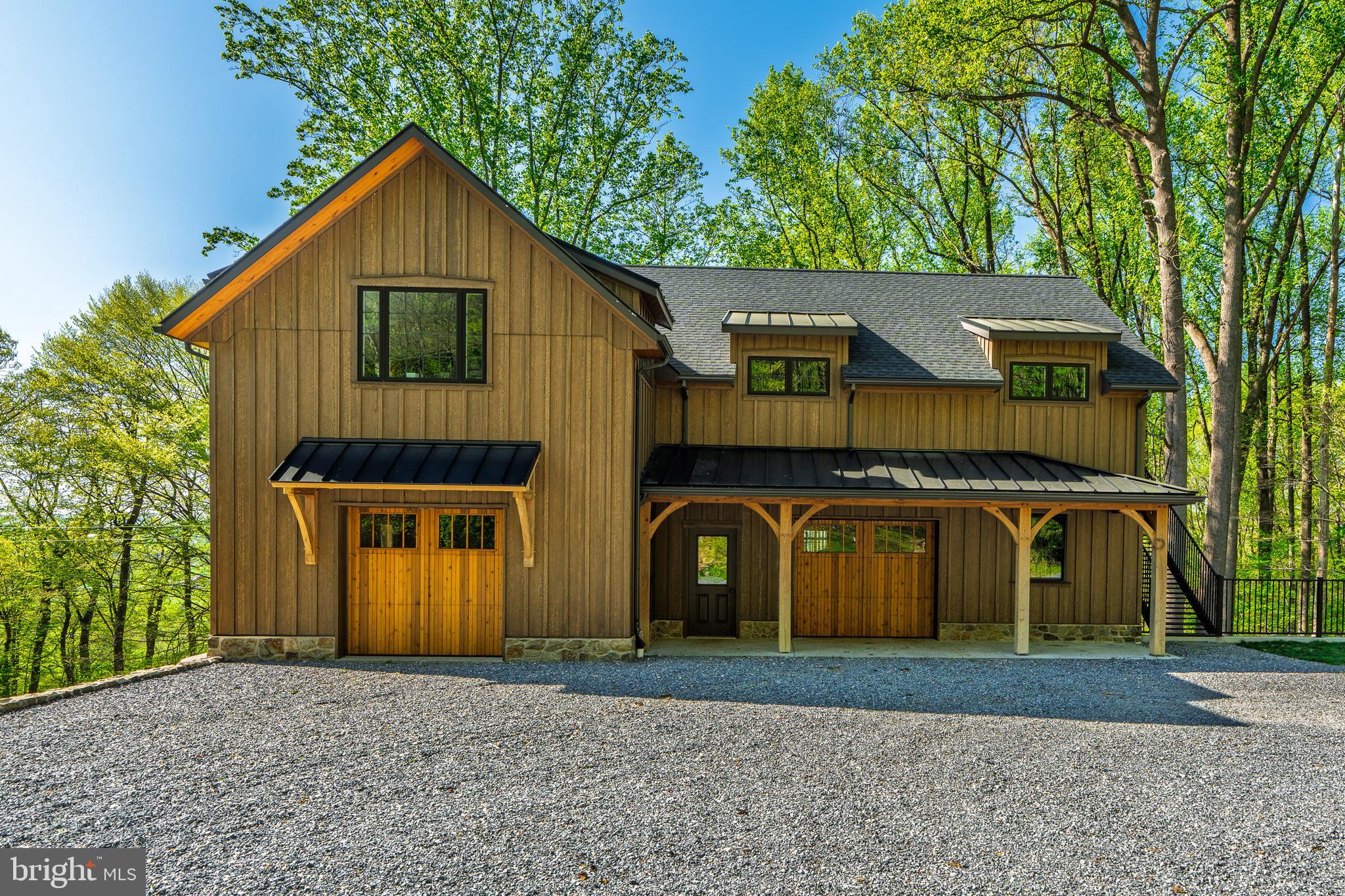 6309 Plank Road Narvon, PA 17555 - Photo 4 of 14 a front view of a house with a yard and garage