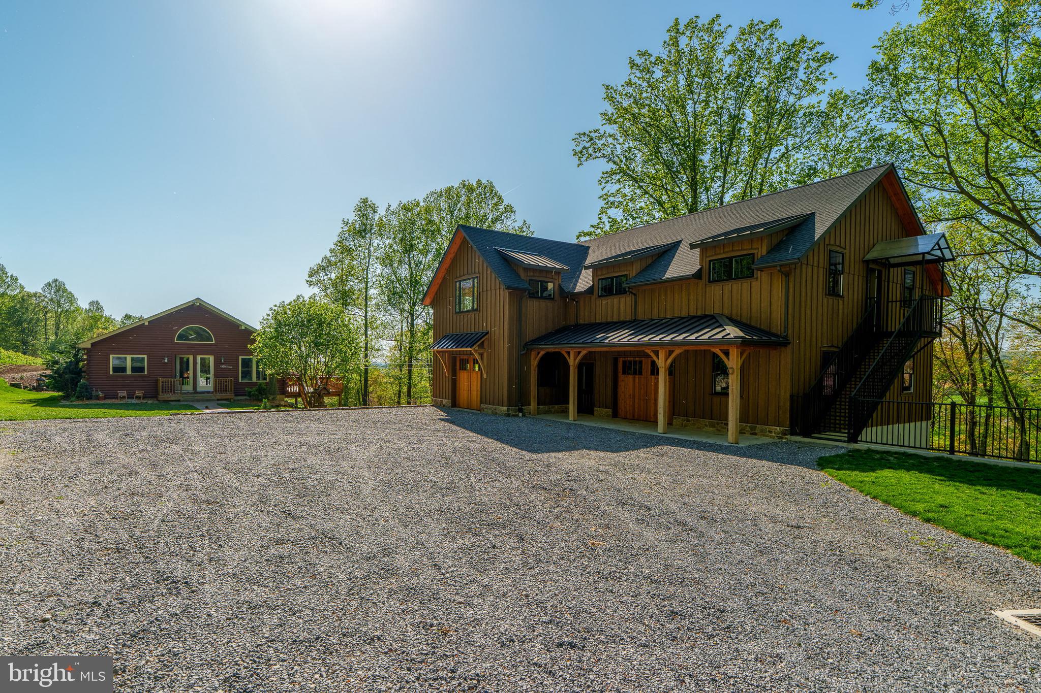 6309 Plank Road Narvon, PA 17555 - Photo 5 of 14 a front view of a house with a yard and garage
