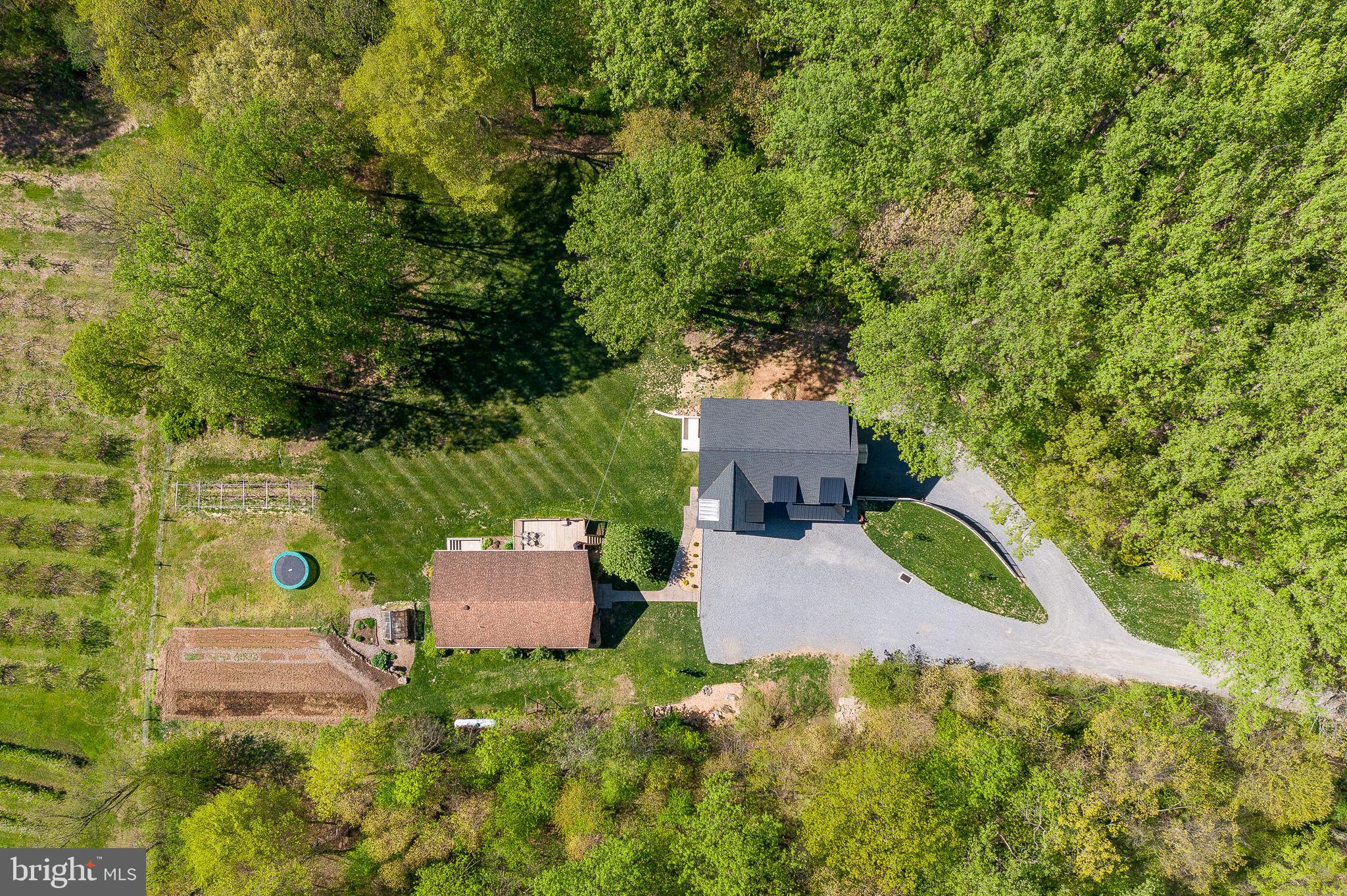 6309 Plank Road Narvon, PA 17555 - Photo 9 of 14 an aerial view of a house with a yard and trees