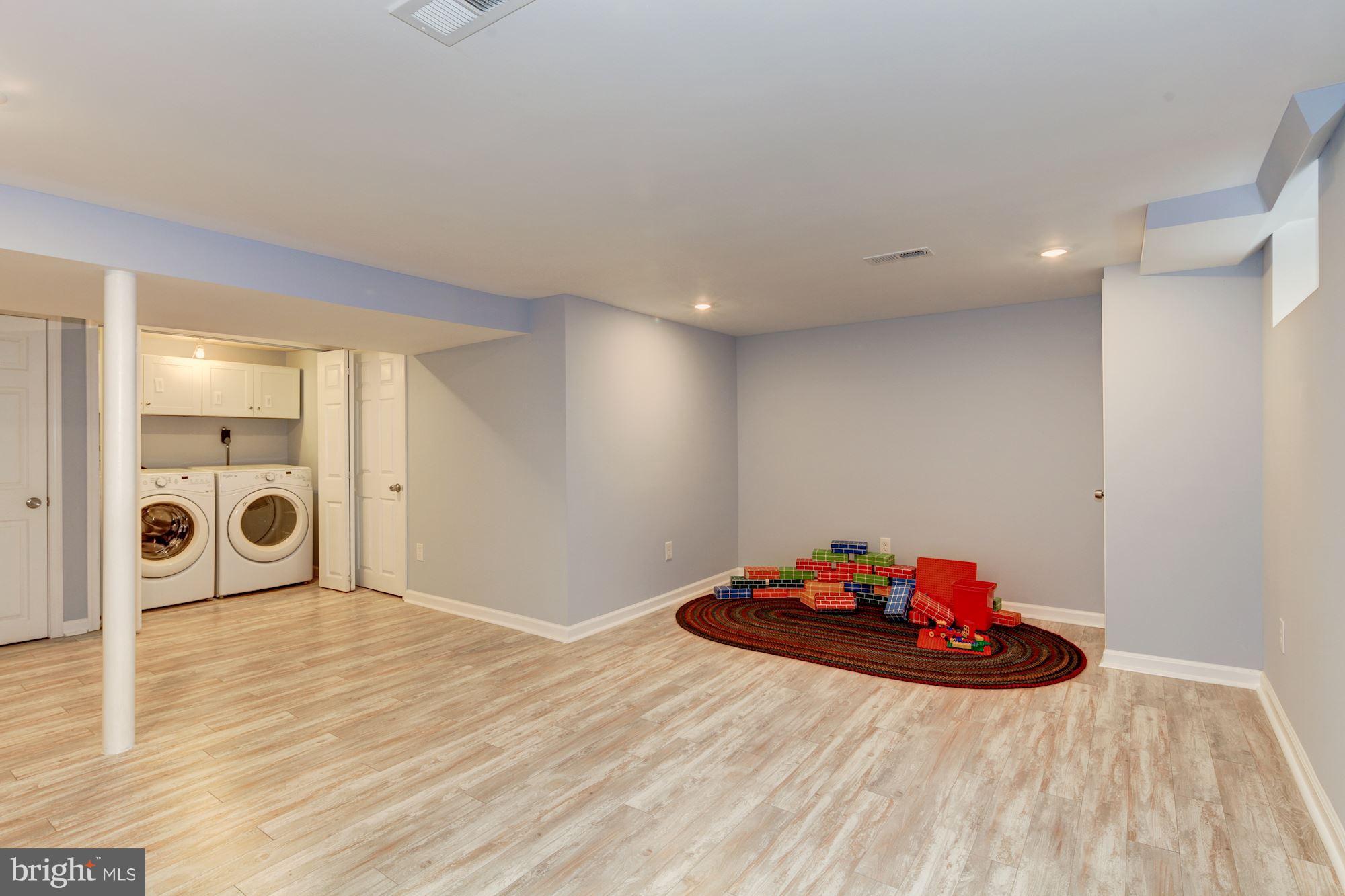 406 Alabama Road Baltimore, MD 21204 - Photo 15 of 29 Newly finished Lower Level w/Half Bath/Laundry