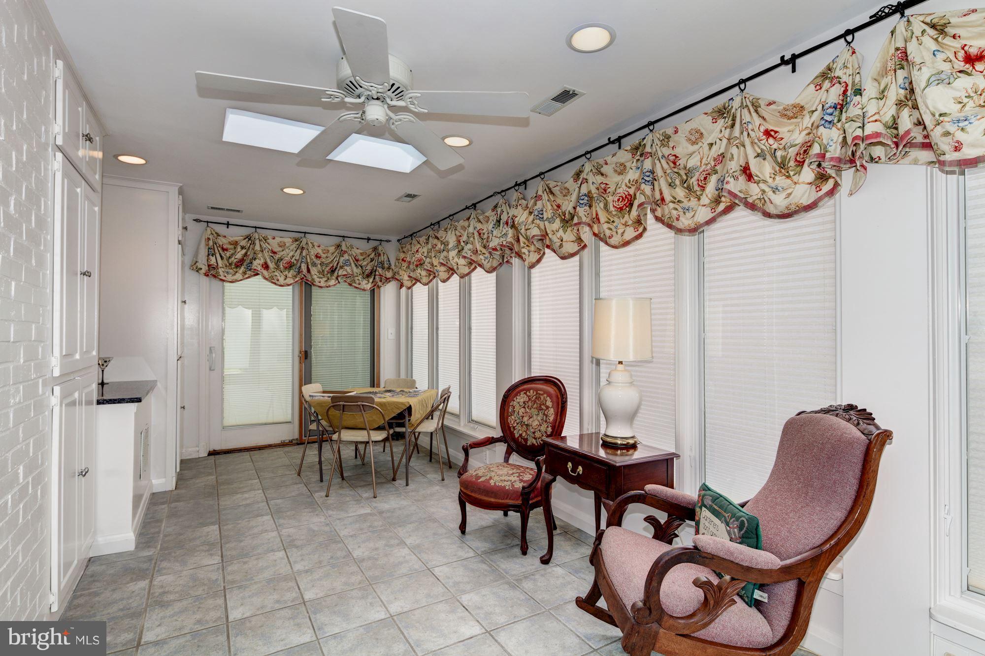406 Alabama Road Baltimore, MD 21204 - Photo 5 of 29 Sun Room w/Skylights/Ceiling Fan