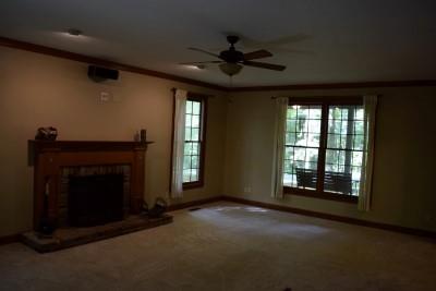205 Laurel Crown Road Manchester, TN 37355 - Photo 6 of 16 a view of an empty room with a fireplace and a window