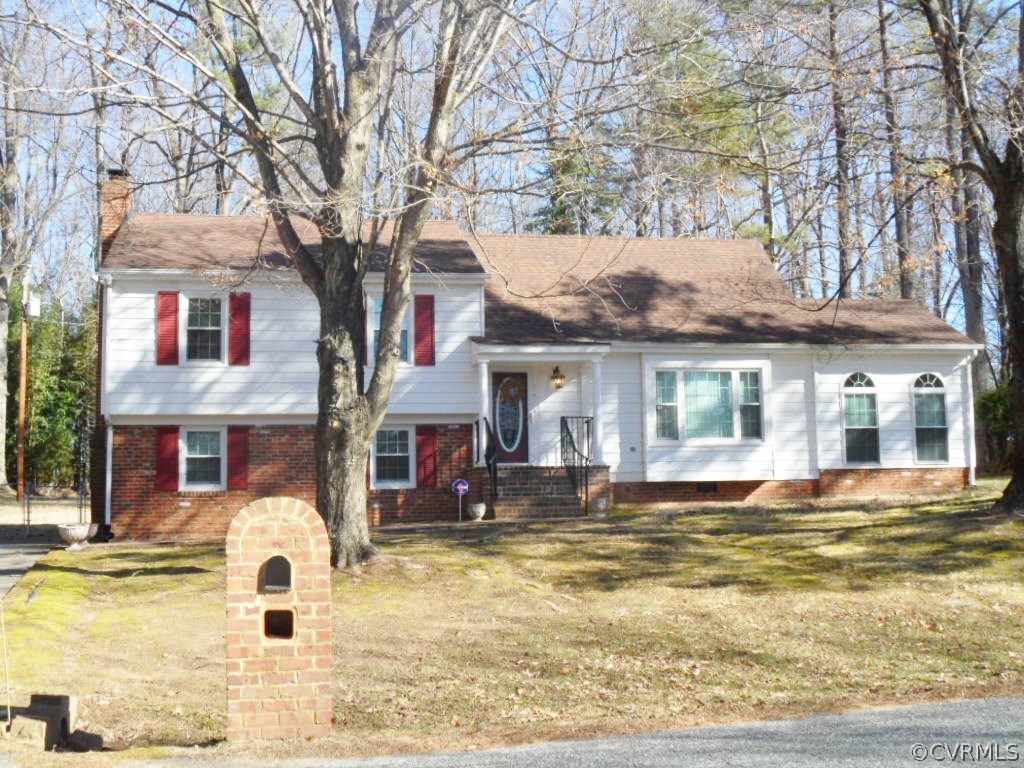 3725 Cheyenne Road Richmond, VA 23235 - Photo 1 of 24 a front view of a house with swimming pool