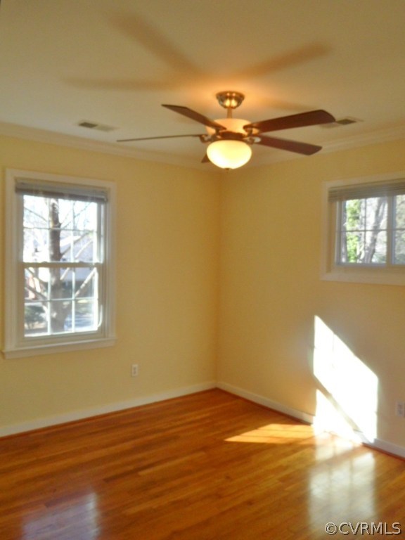3725 Cheyenne Road Richmond, VA 23235 - Photo 20 of 24 a view of empty room with wooden floor and fan