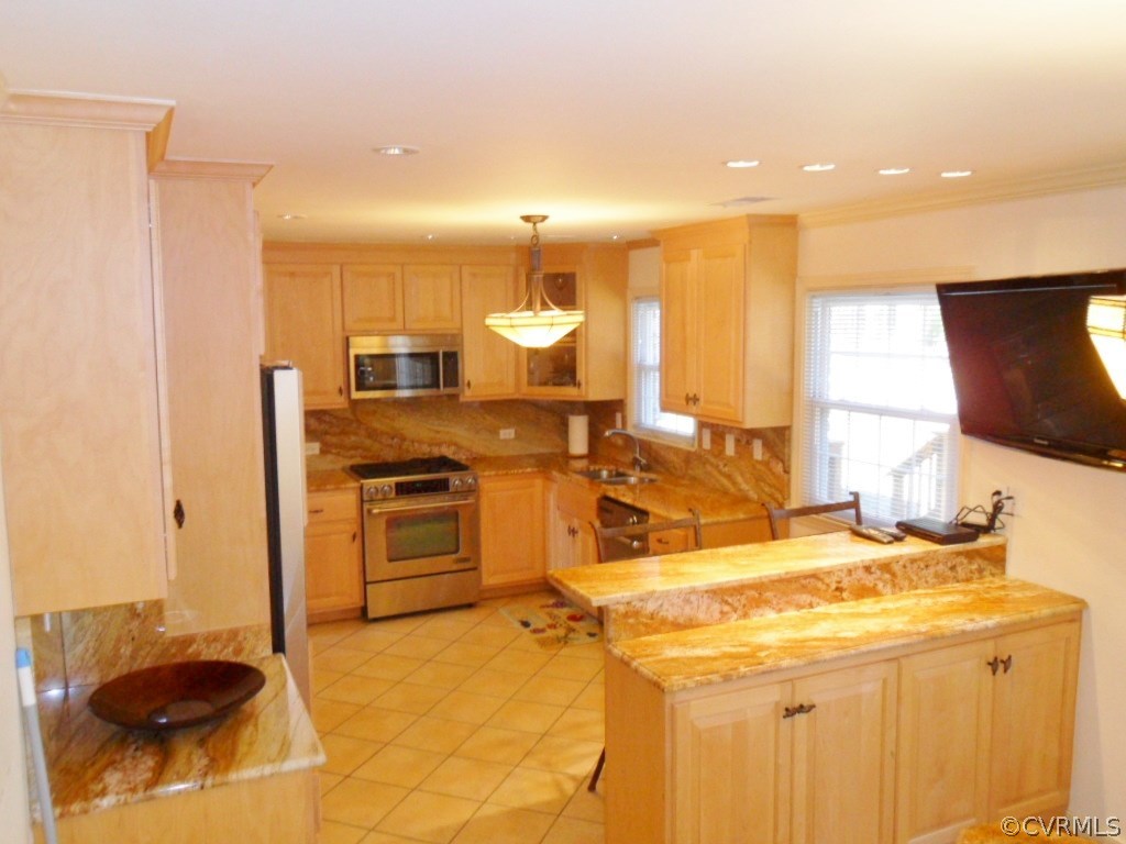 3725 Cheyenne Road Richmond, VA 23235 - Photo 8 of 24 a kitchen with a sink appliances and cabinets
