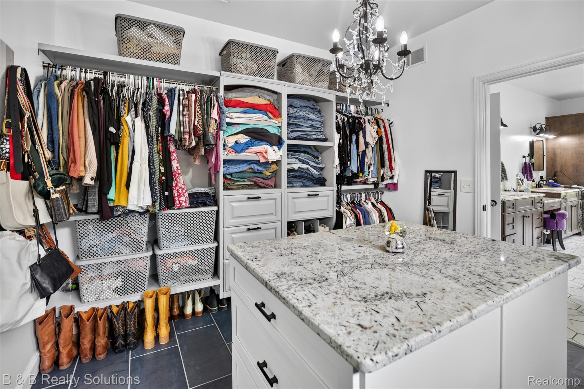 6204 Fish Lake Road North Branch, MI 48461 - Photo 29 of 79 Custom closet organization system featuring white cabinetry and shelving