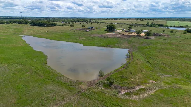 a view of a golf course with a garden