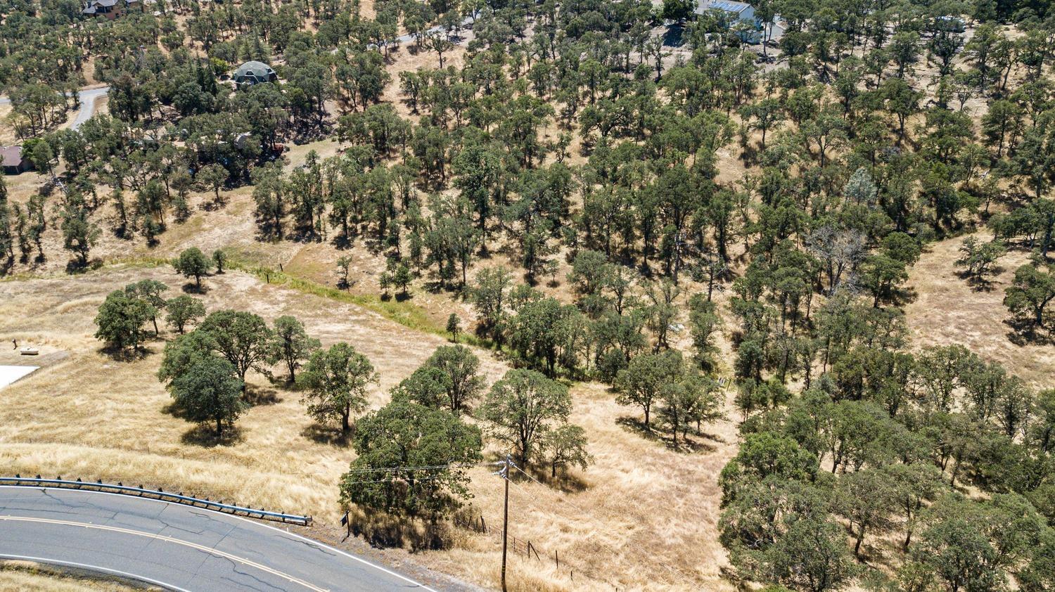 1375 Cheyenne Road Copperopolis, CA 95228 - Photo 5 of 7 a view of a yard of a building