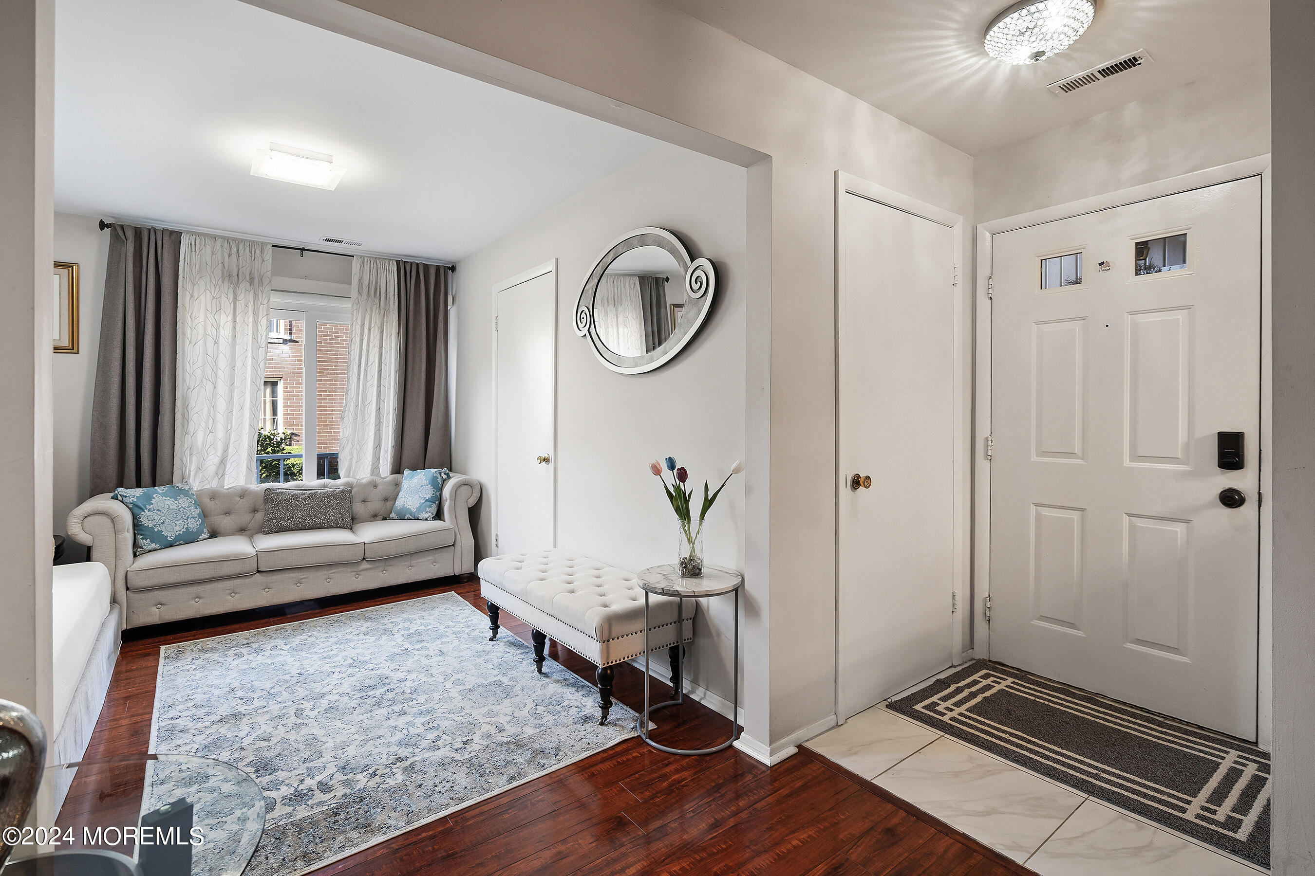 509 Harding Road, Unit 2 Freehold, NJ 07728 - Photo 6 of 24 a living room with furniture and a window