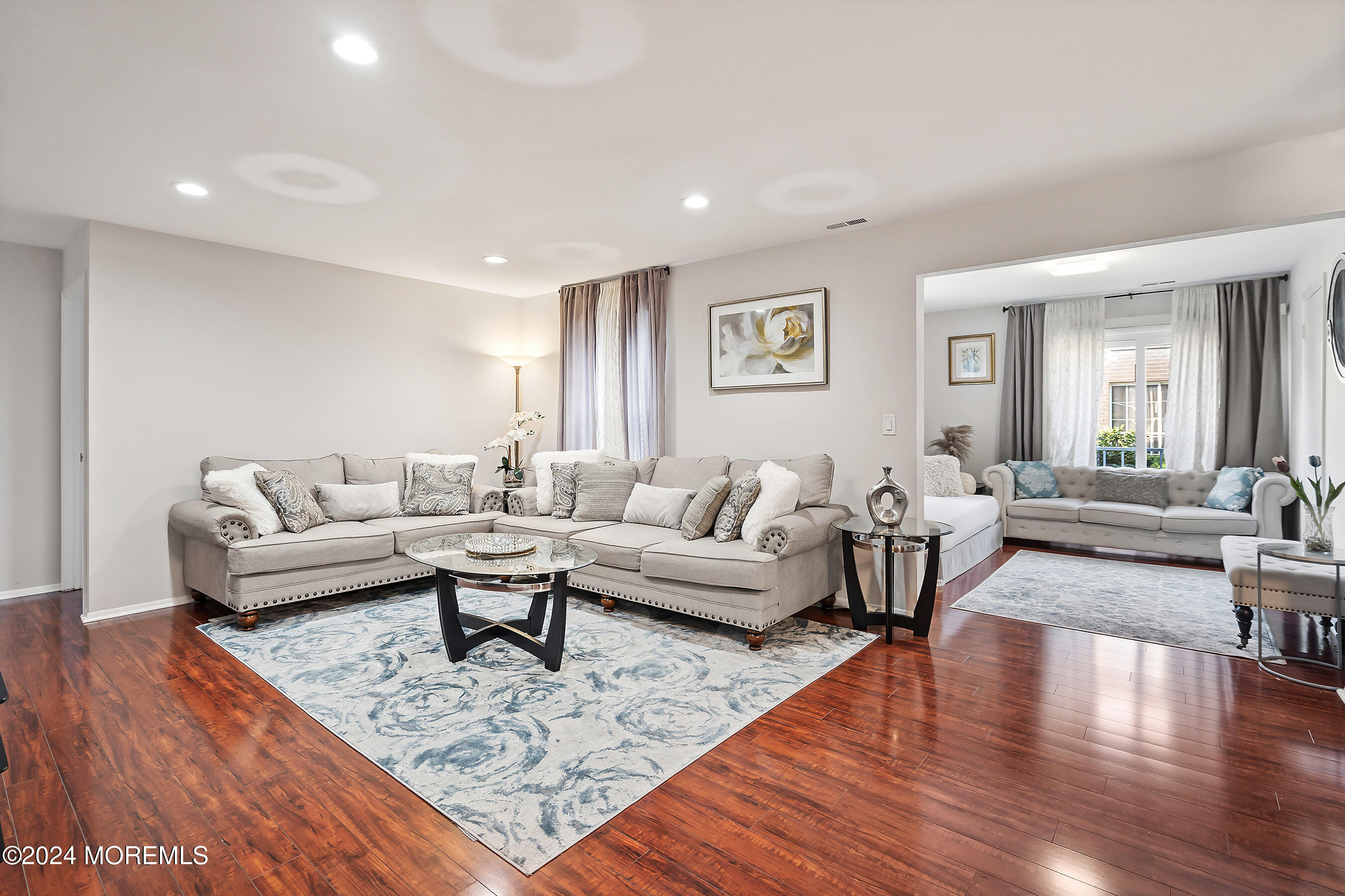 509 Harding Road, Unit 2 Freehold, NJ 07728 - Photo 9 of 24 a living room with furniture and a wooden floor