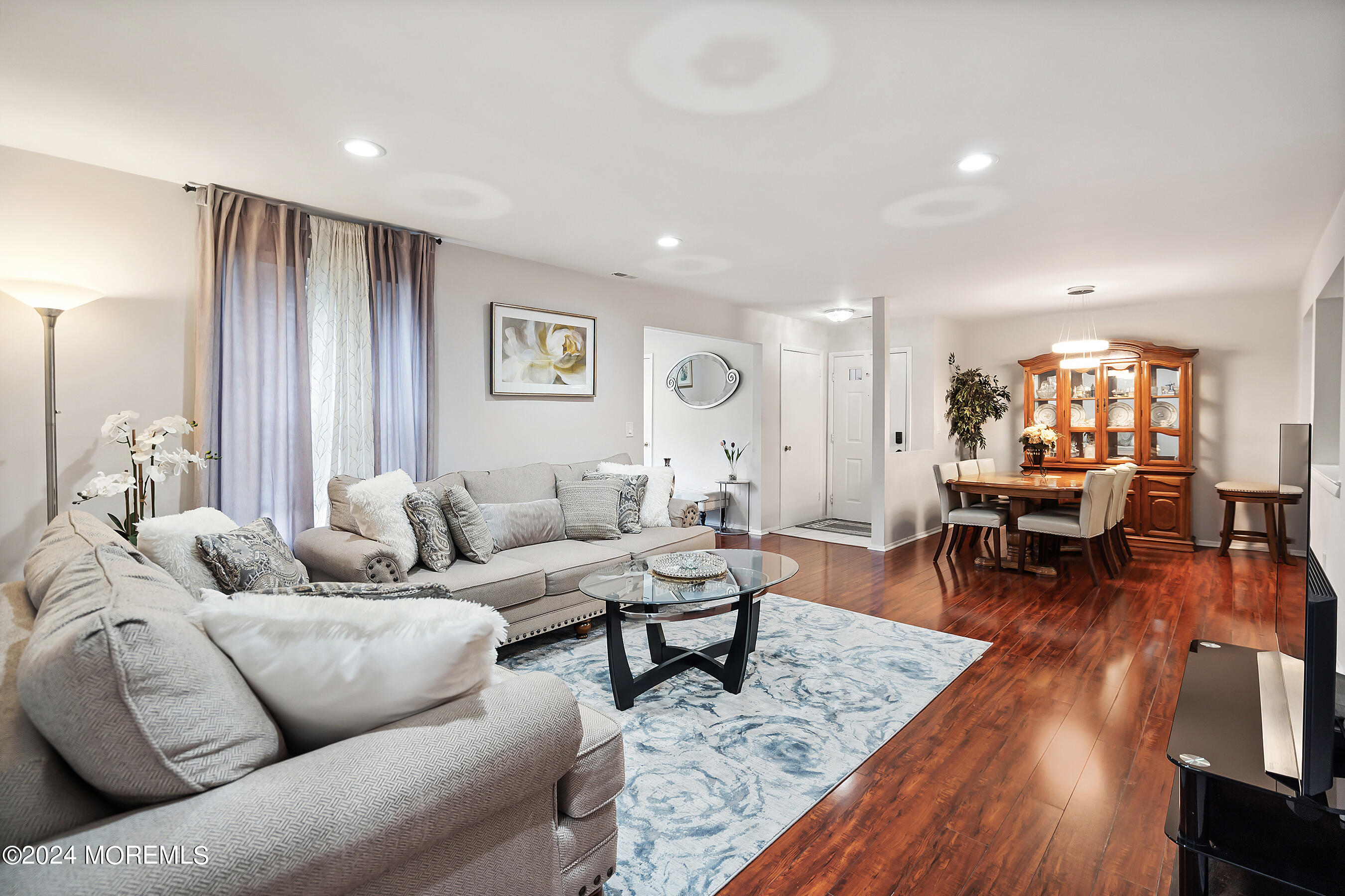 509 Harding Road, Unit 2 Freehold, NJ 07728 - Photo 10 of 24 a living room with furniture and wooden floor