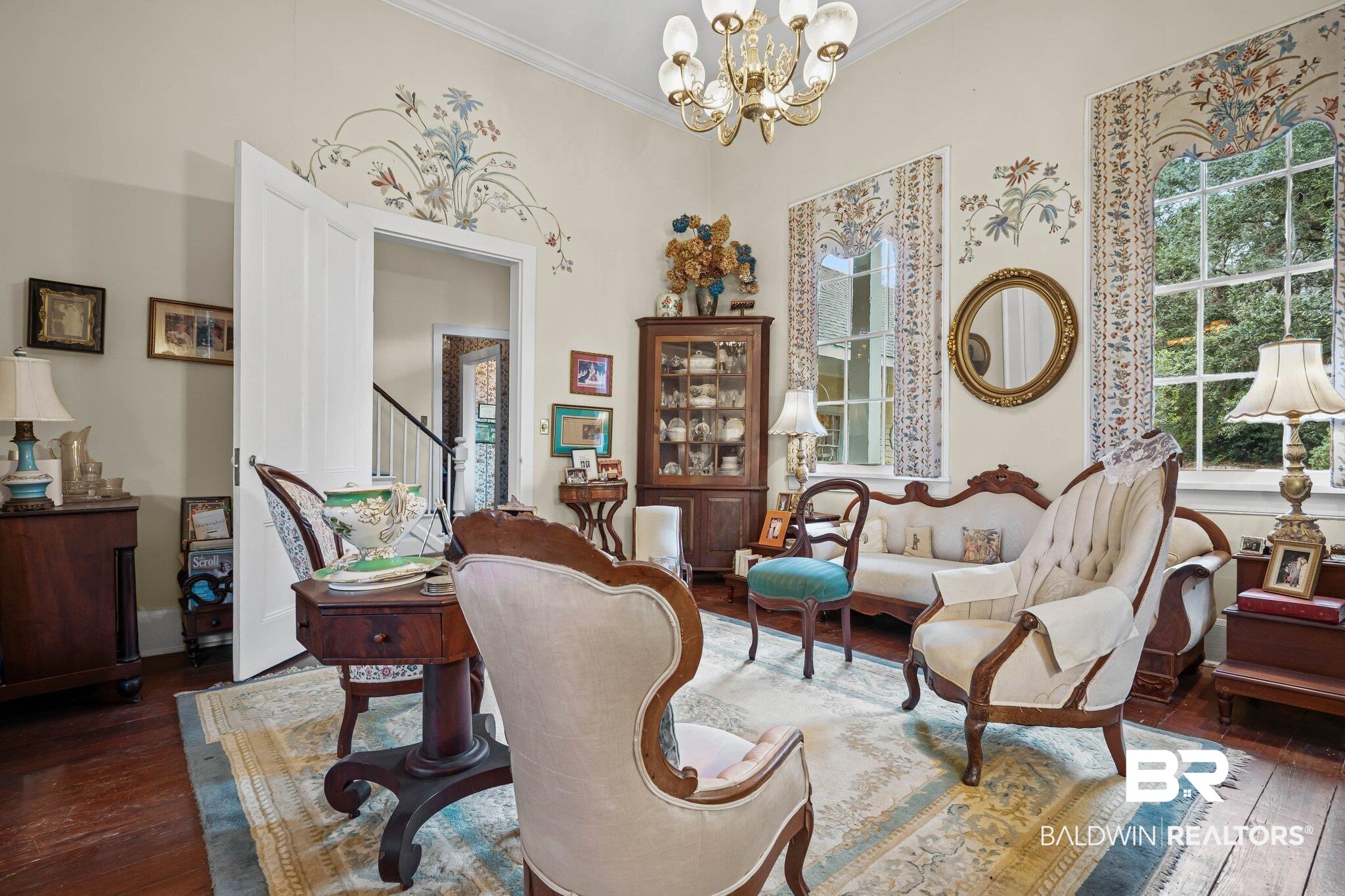 23561 Main Street Fairhope, AL 36532 - Photo 11 of 45 Office area featuring dark wood finished floors, a chandelier, and ornamental molding