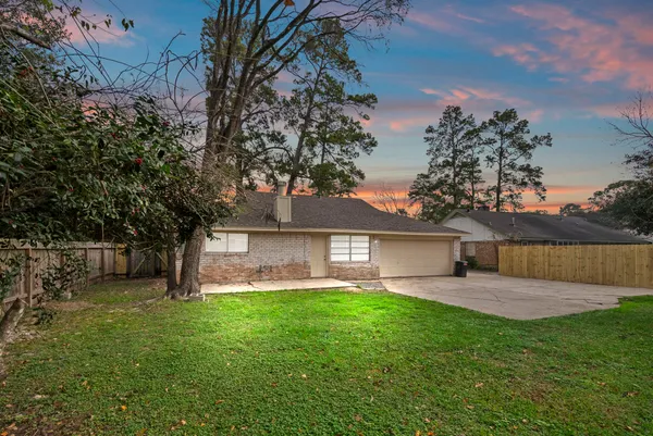a view of a house with a yard porch and sitting area