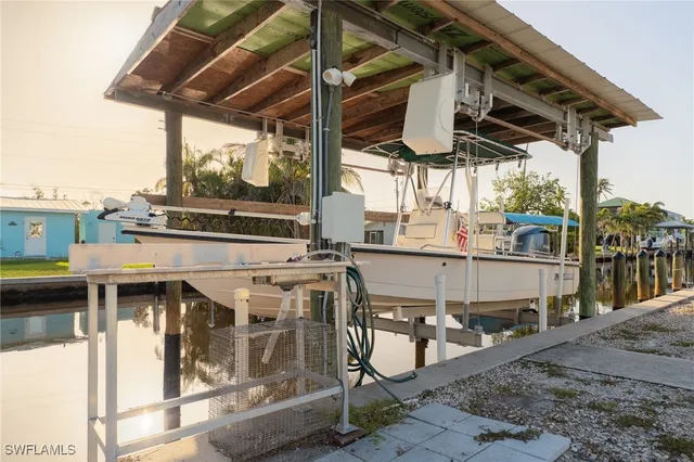 a view of a chairs and table in the patio