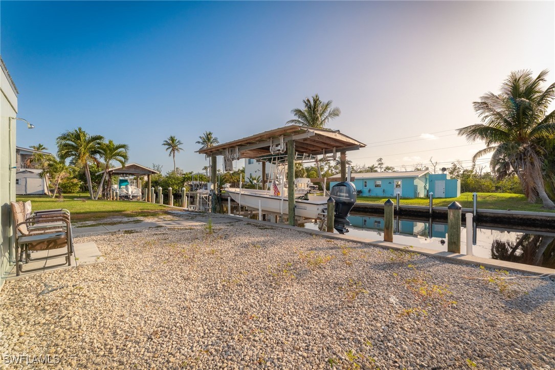 16341 Porto Bello Street Bokeelia, FL 33922 - Photo 26 of 50 swimming pool view with a seating space