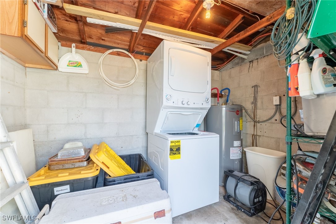 16341 Porto Bello Street Bokeelia, FL 33922 - Photo 27 of 50 a utility room with dryer and washer