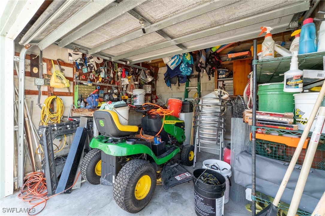 16341 Porto Bello Street Bokeelia, FL 33922 - Photo 28 of 50 a store room filled with furniture and a chandelier