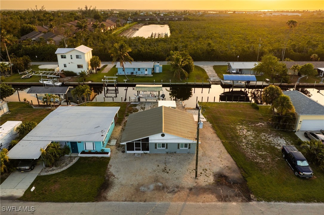 16341 Porto Bello Street Bokeelia, FL 33922 - Photo 34 of 50 an aerial view of a house with a ocean view