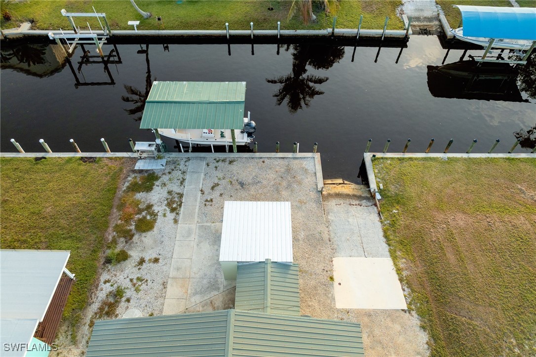 16341 Porto Bello Street Bokeelia, FL 33922 - Photo 37 of 50 an aerial view of residential houses with outdoor space