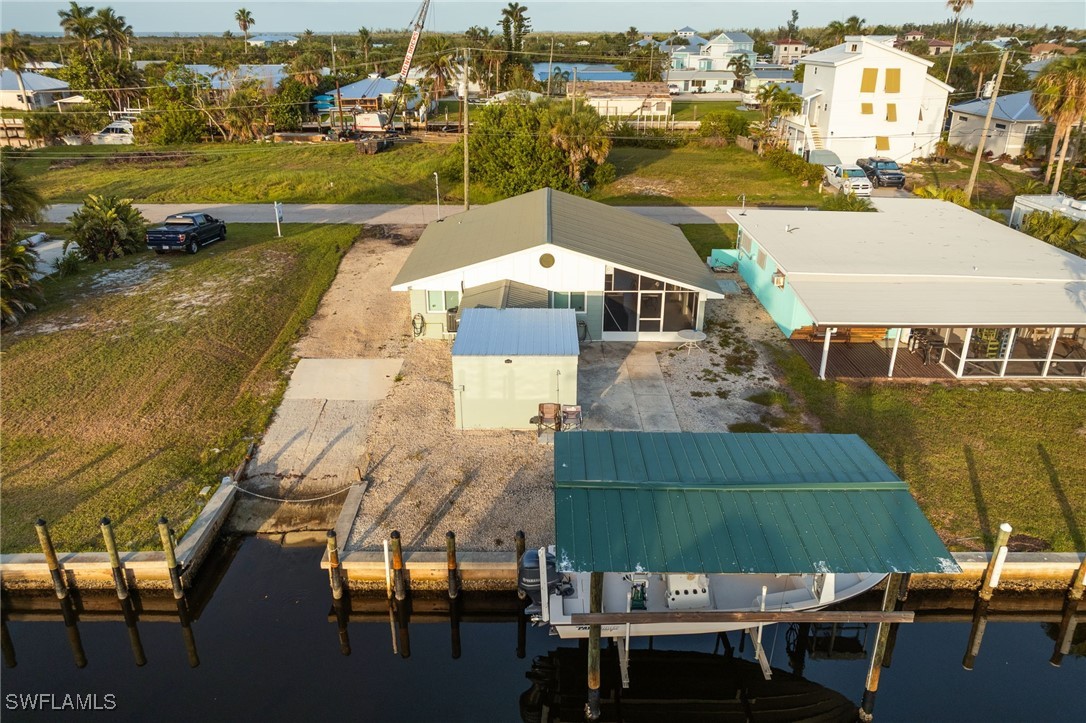 16341 Porto Bello Street Bokeelia, FL 33922 - Photo 38 of 50 a view of a lake in middle of the town