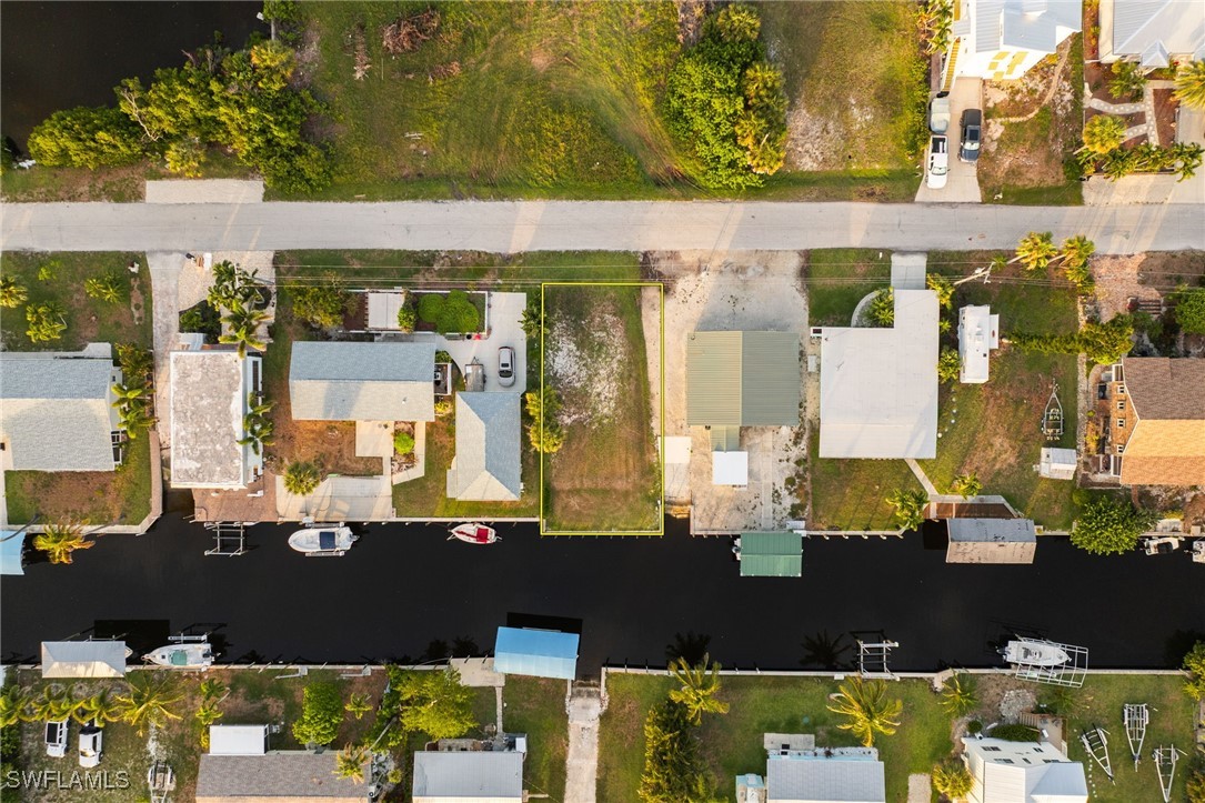 16341 Porto Bello Street Bokeelia, FL 33922 - Photo 46 of 50 an aerial view of a houses