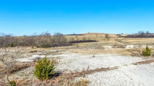 an aerial view of residential house and lake