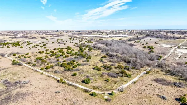 a view of a lake with mountain in the background