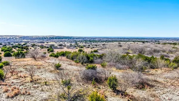 a view of a pathway with a lake