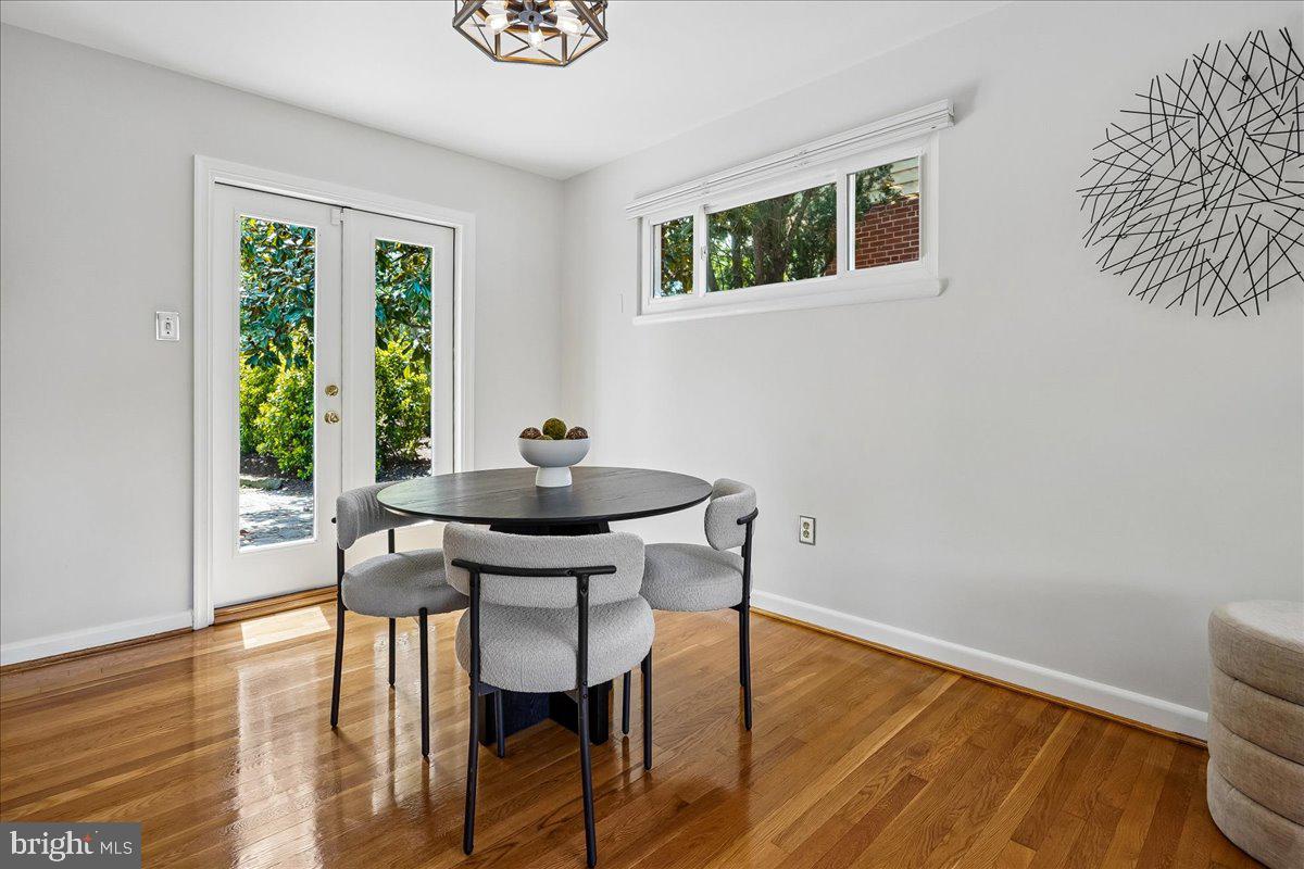 104 Belton Road Silver Spring, MD 20901 - Photo 20 of 56 a view of a dining room with furniture and wooden floor