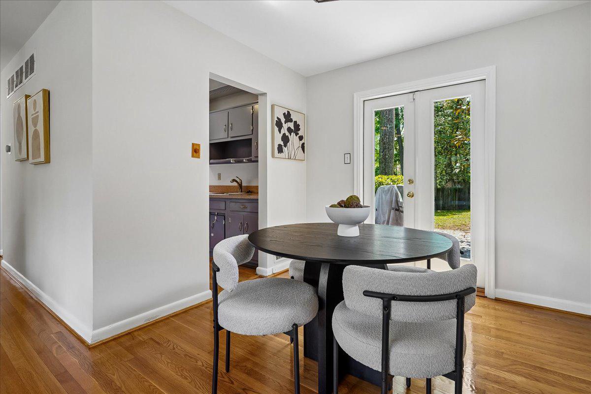 104 Belton Road Silver Spring, MD 20901 - Photo 21 of 56 a view of a dining room with furniture and wooden floor