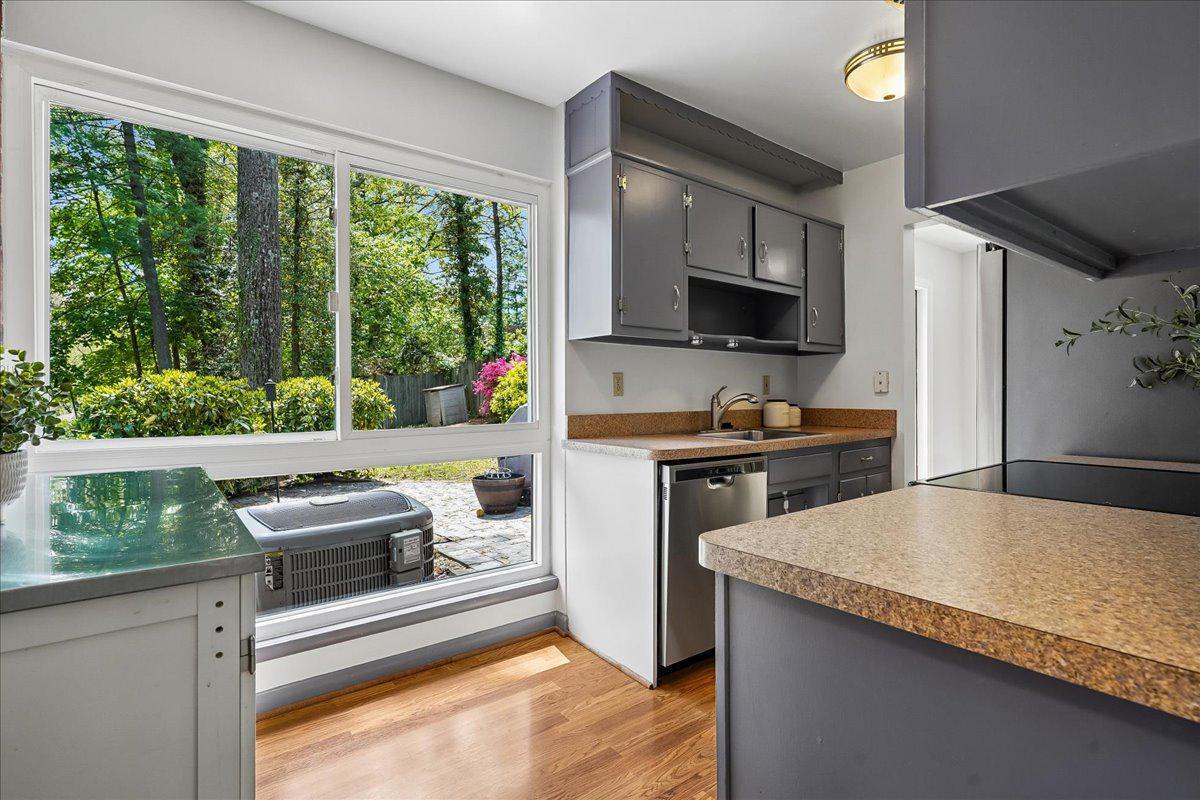 104 Belton Road Silver Spring, MD 20901 - Photo 27 of 56 a kitchen with a sink and a stove top oven