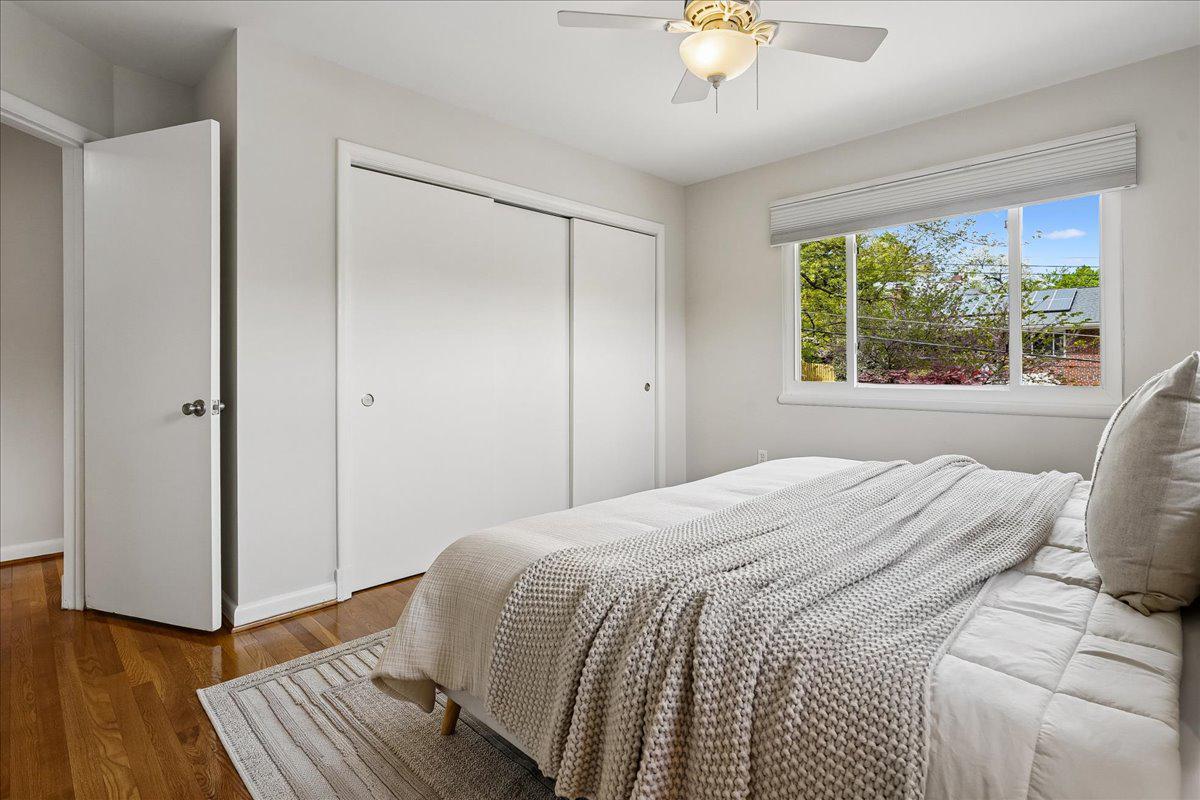 104 Belton Road Silver Spring, MD 20901 - Photo 34 of 56 a bedroom with a bed and a window