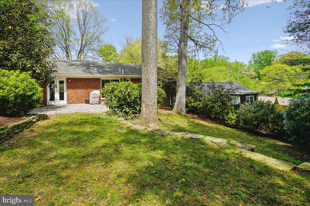 104 Belton Road Silver Spring, MD 20901 - Photo 49 of 56 a view of a house with garden
