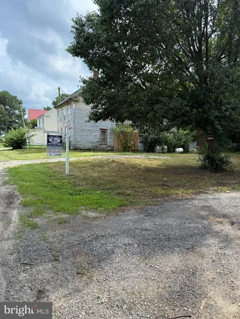 a house with yard in front of it