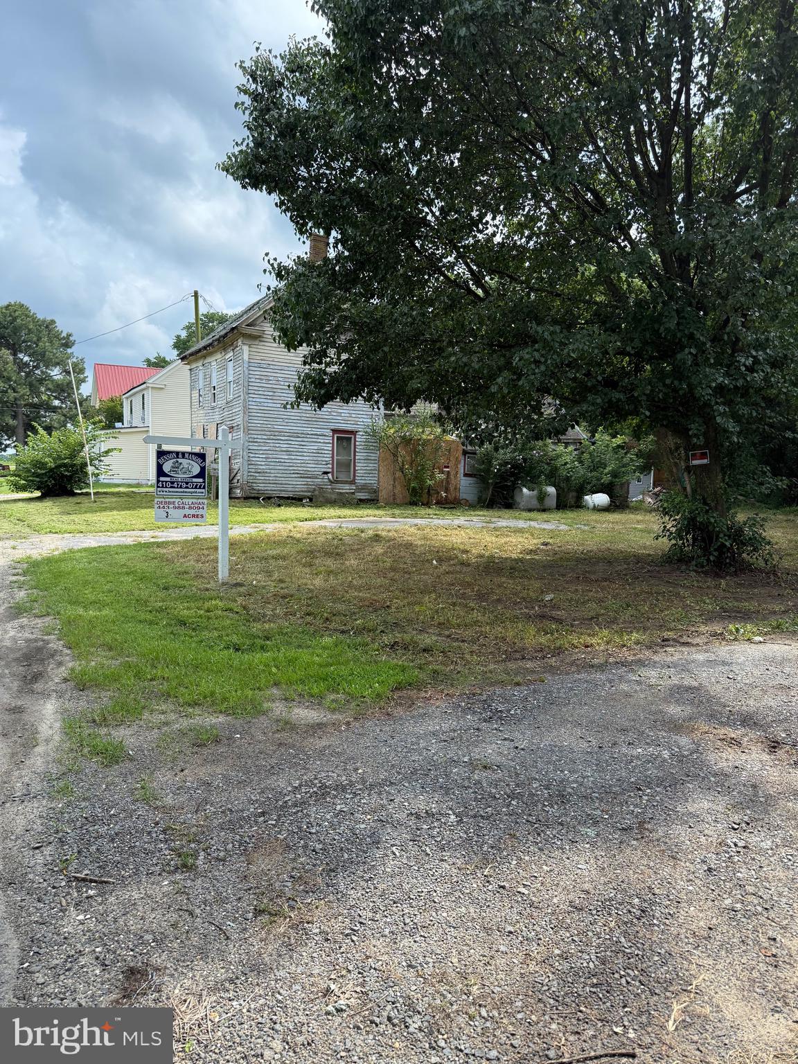 10440 Burrsville Road Denton, MD 21629 - Photo 5 of 9 a house with yard in front of it