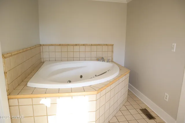 a bathroom with a bathtub