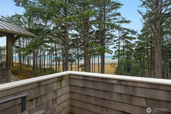 a view of balcony with yard