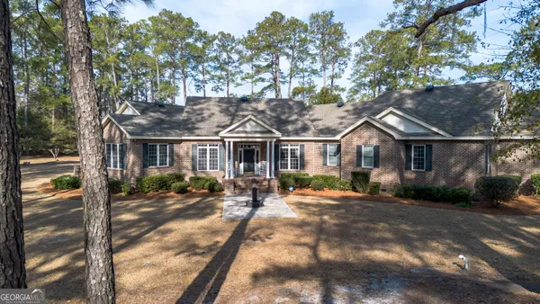a front view of house with a outdoor space