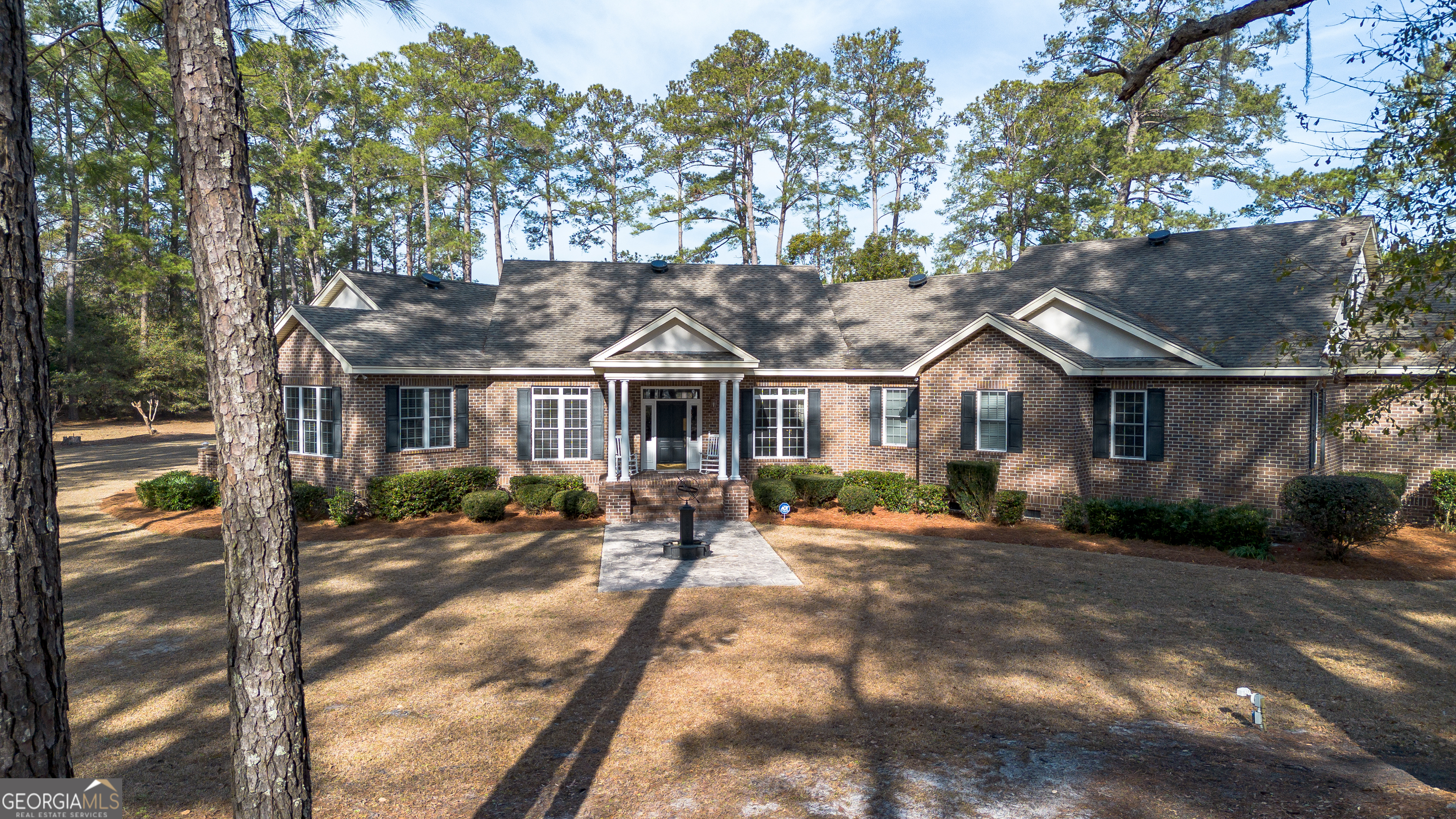 a front view of house with a outdoor space