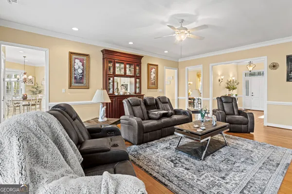 a living room with furniture or couch and a window
