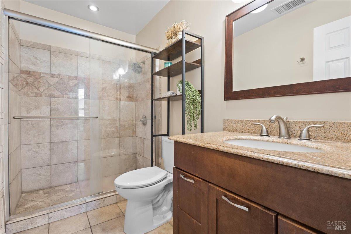 303 Algiers Court Santa Rosa, CA 95409 - Photo 19 of 27 Upstairs full bath with walk in shower and spacious vanity.