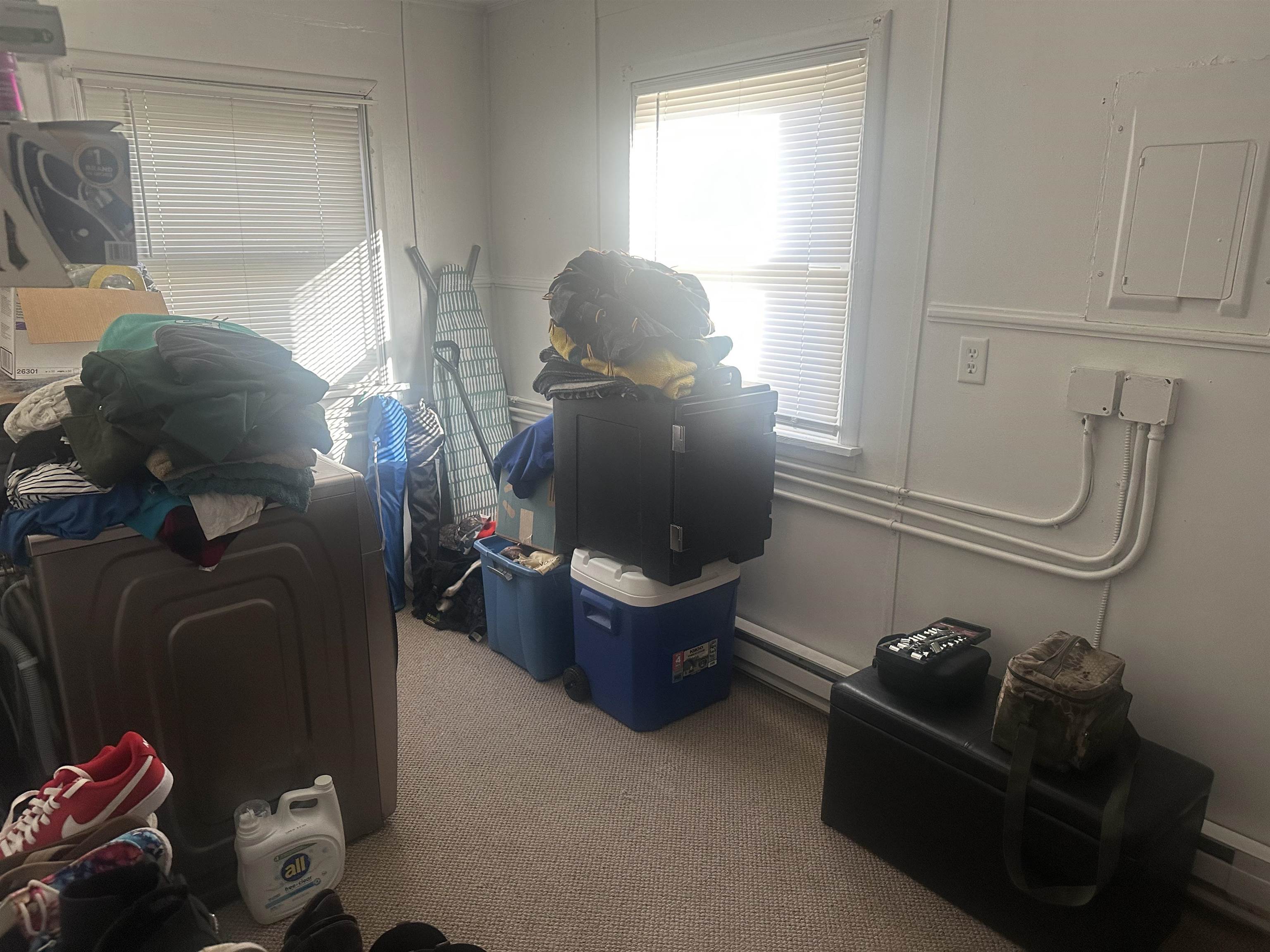 3512 Belknap Street Superior, WI 54880 - Photo 15 of 24 Interior space with light colored carpet, electric panel, and a baseboard radiator