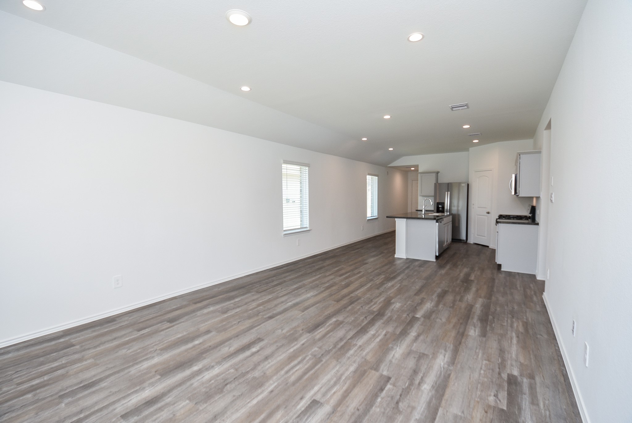 5718 Sycamore Glen Dr Spring Spring, TX 77373 - Photo 13 of 33 a view of empty room with wooden floor