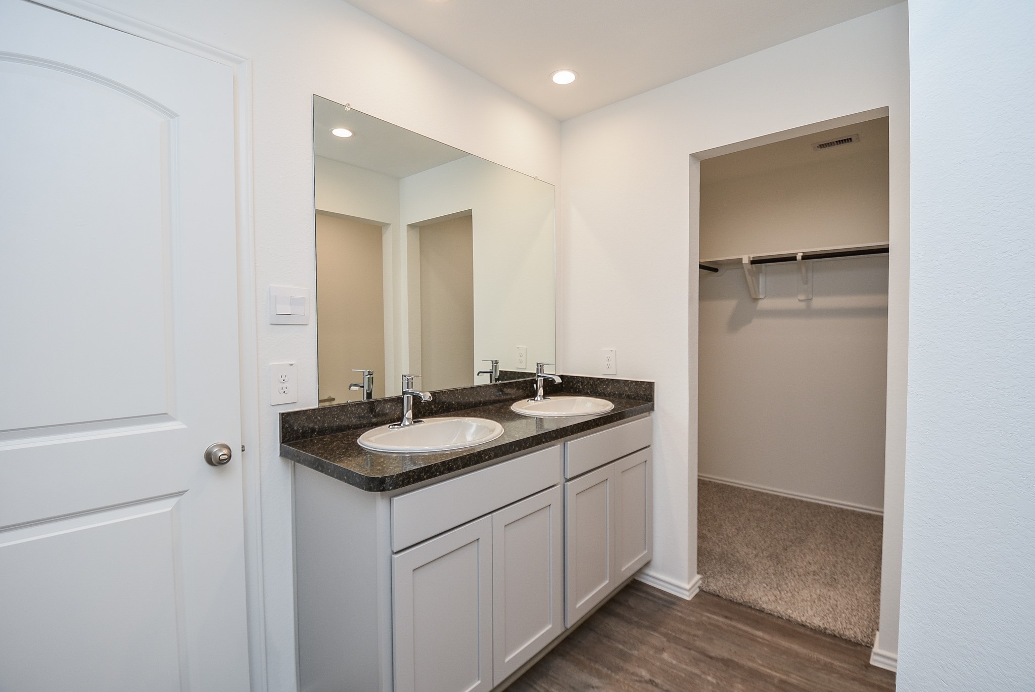 5718 Sycamore Glen Dr Spring Spring, TX 77373 - Photo 18 of 33 a bathroom with a granite countertop sink and a mirror