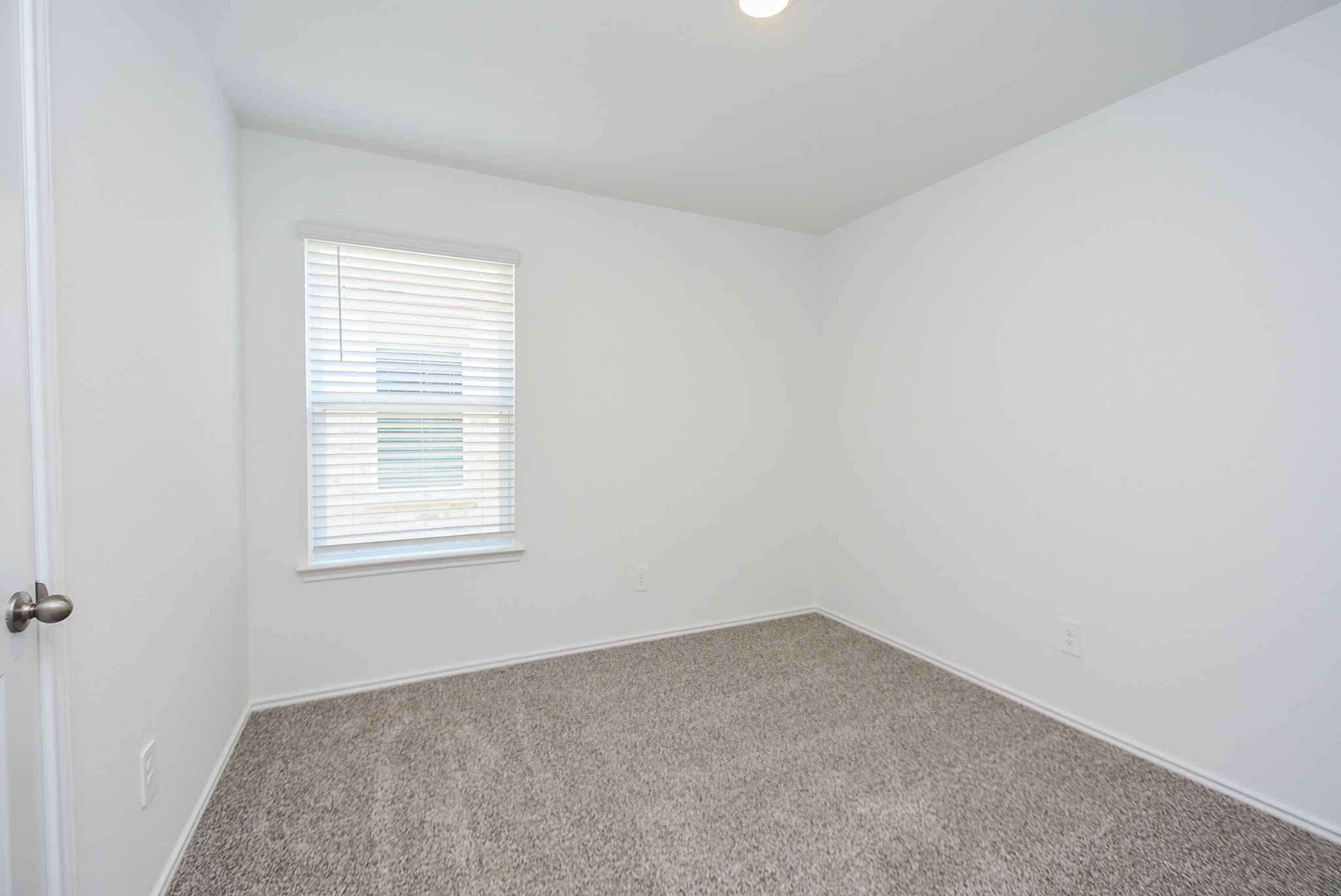 5718 Sycamore Glen Dr Spring Spring, TX 77373 - Photo 20 of 33 an empty room with a window