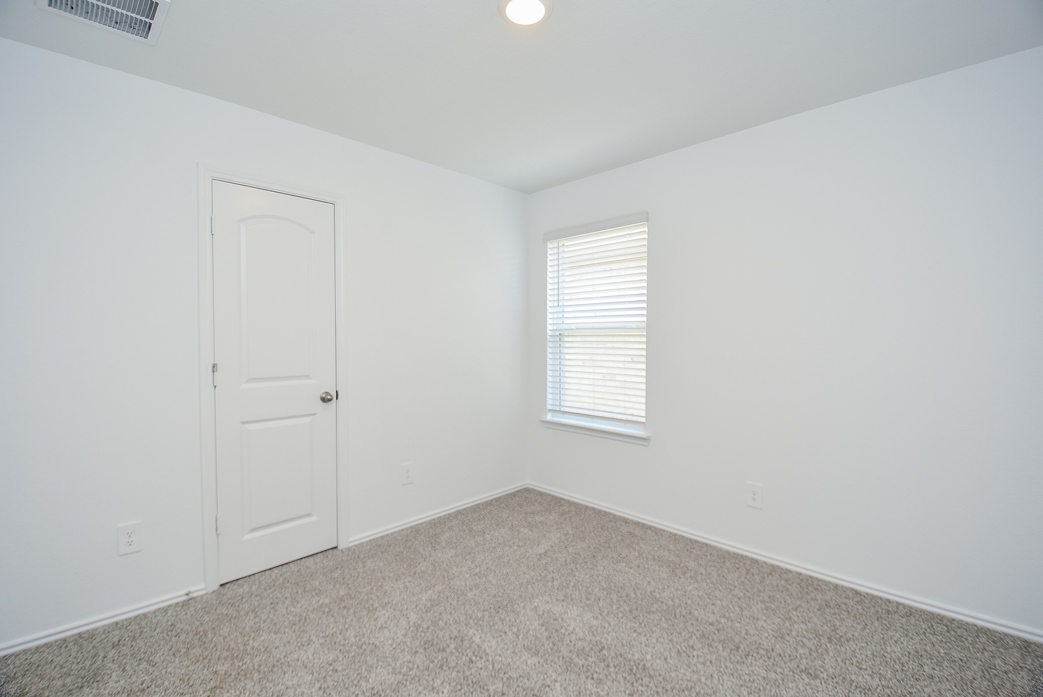 5718 Sycamore Glen Dr Spring Spring, TX 77373 - Photo 22 of 33 an empty room with windows