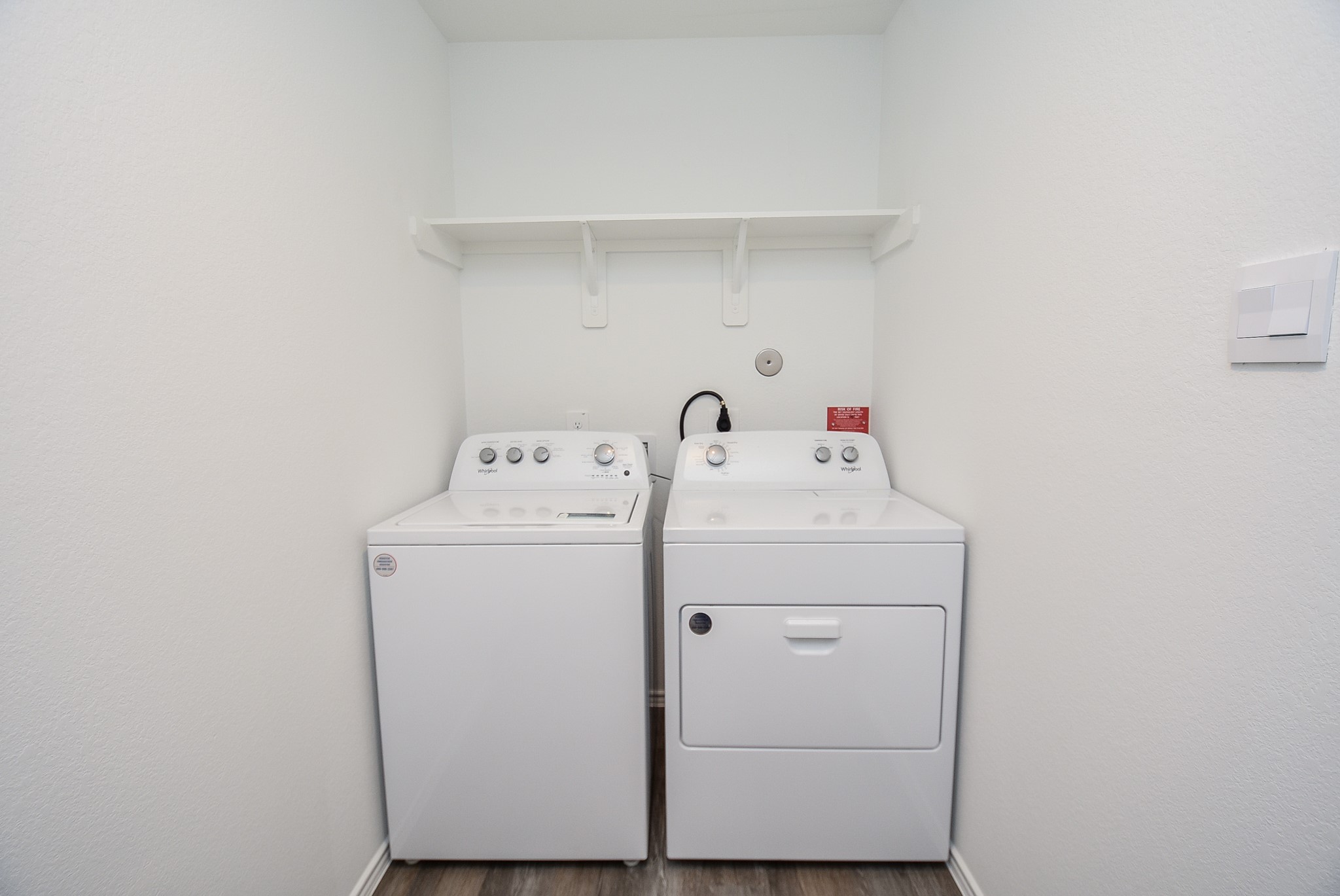 5718 Sycamore Glen Dr Spring Spring, TX 77373 - Photo 27 of 33 a utility room with dryer and washer