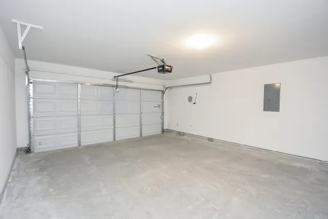 a house that has garden in front of it