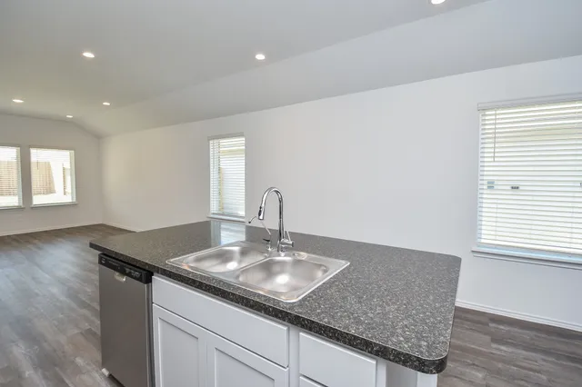 a view of kitchen with wooden floor