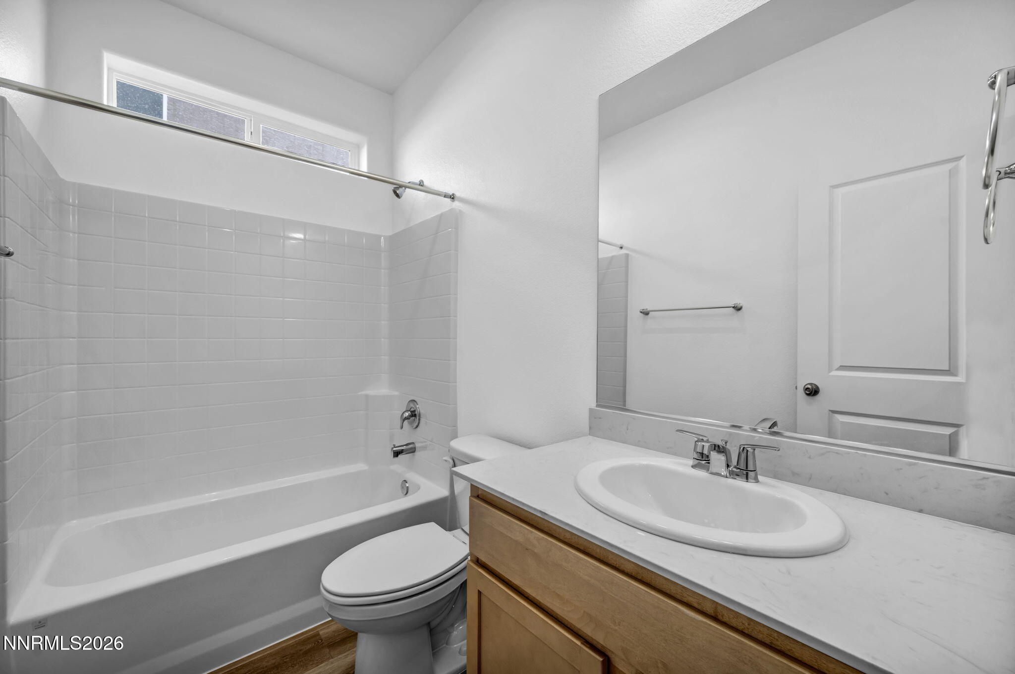 6676 Morgan Mill Road, Unit HOMESITE 14 Carson City, NV 89701 - Photo 15 of 24 a bathroom with a sink toilet tub vanity and shower